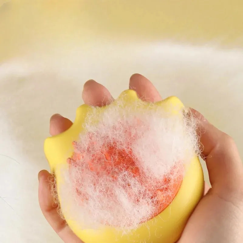 Pet bath brush with shampoo compartment in blue, orange and yellow colours for cat and dog grooming