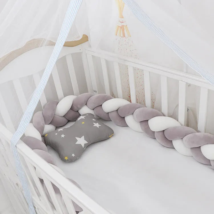 Braided knot baby crib bumper pillow in spandex velvet showing bendable design and colour options.