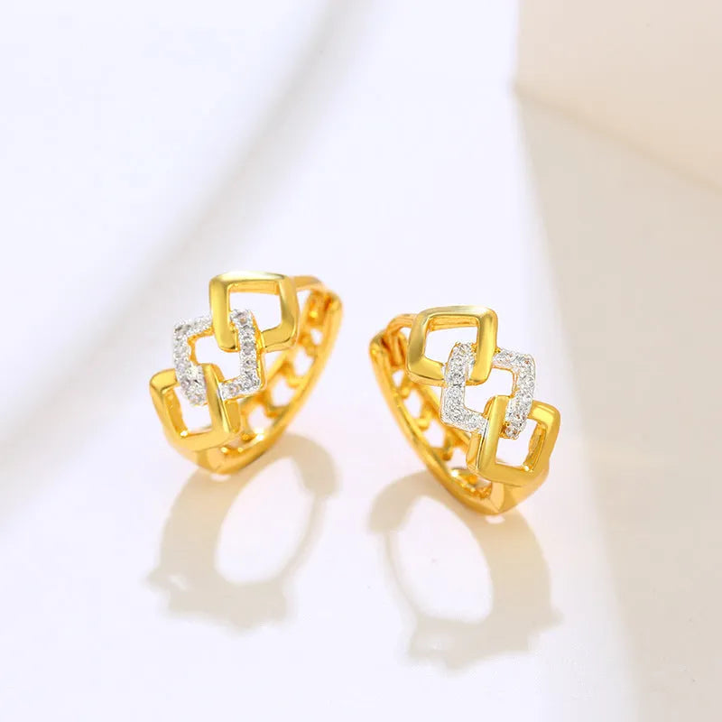 Gold hollow geometric alloy earrings with ear clip fastening