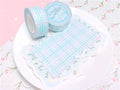 Set of decorative plaid paper tape rolls in five colours with release paper backing