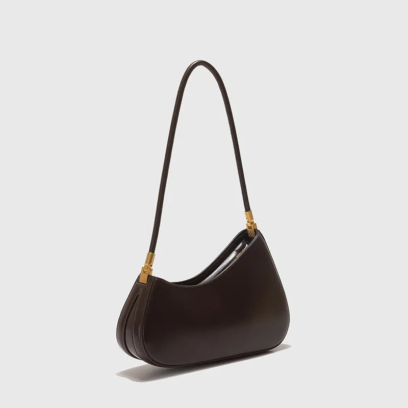 Women's oval shaped PU commuter handbag in multiple colours with internal zip compartment