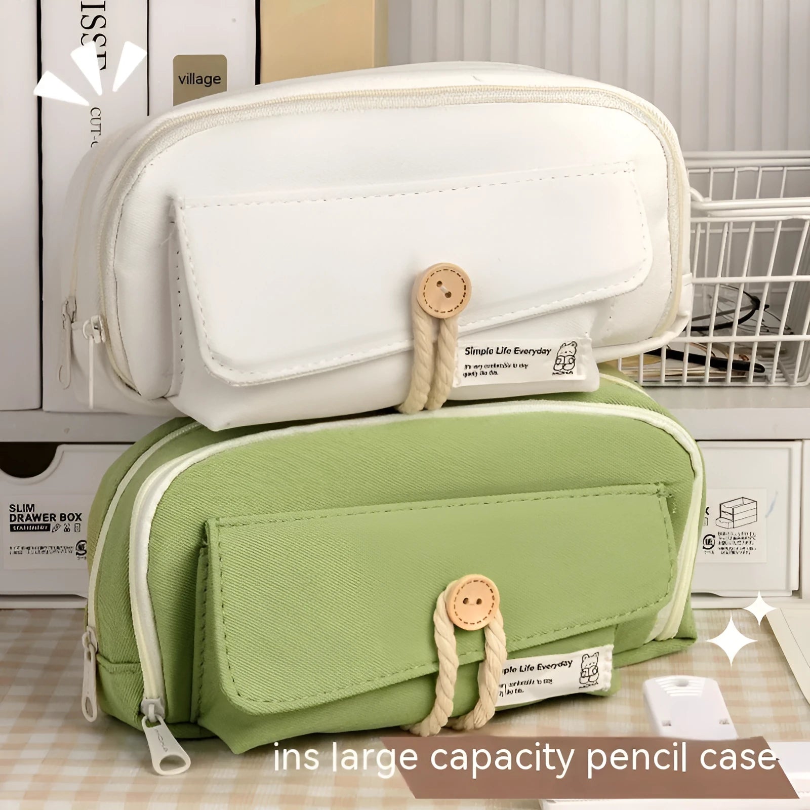 Korean style canvas pencil case in beige, blue, grey, or green holding multiple pens