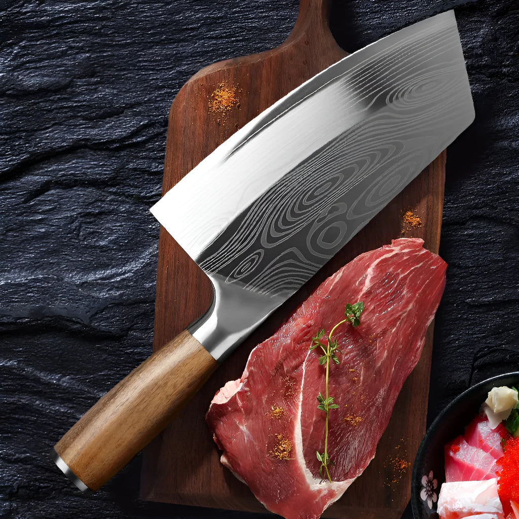 Stainless steel kitchen knife with a 320mm blade on a cutting board.