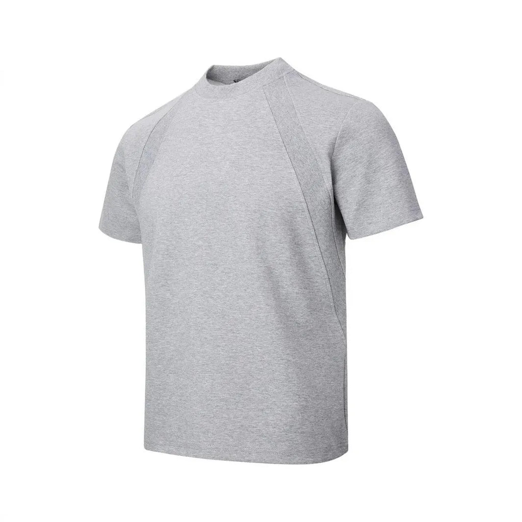 Man's loose grey short sleeve top with textured air layer stitching on the fabric