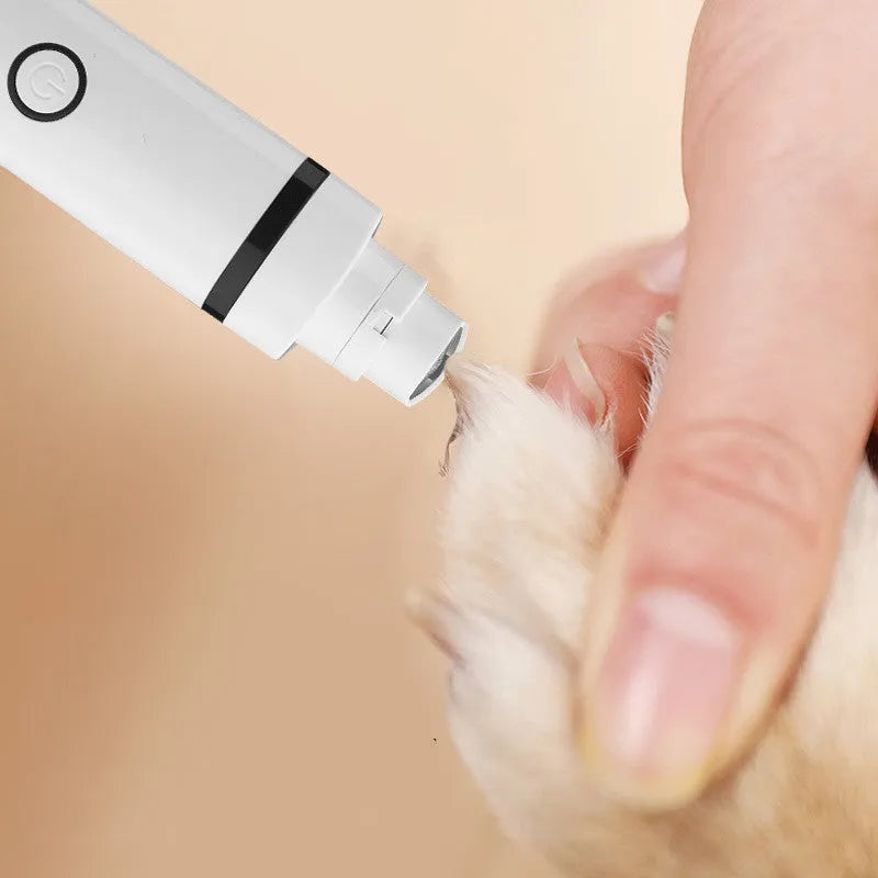 White cordless pet shaving device for dogs with stainless steel blade and automatic grinding head