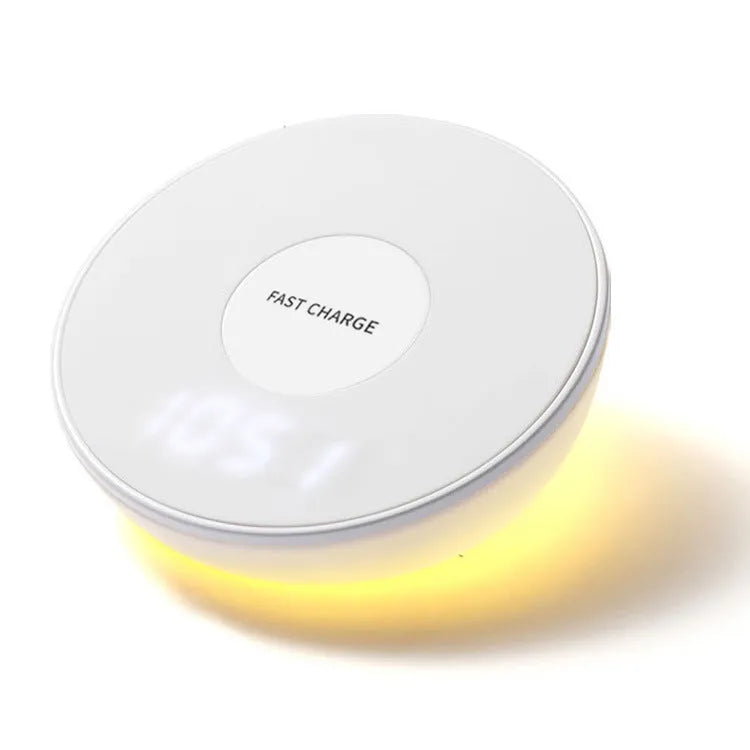 White wireless mobile phone charger with digital clock display showing the time