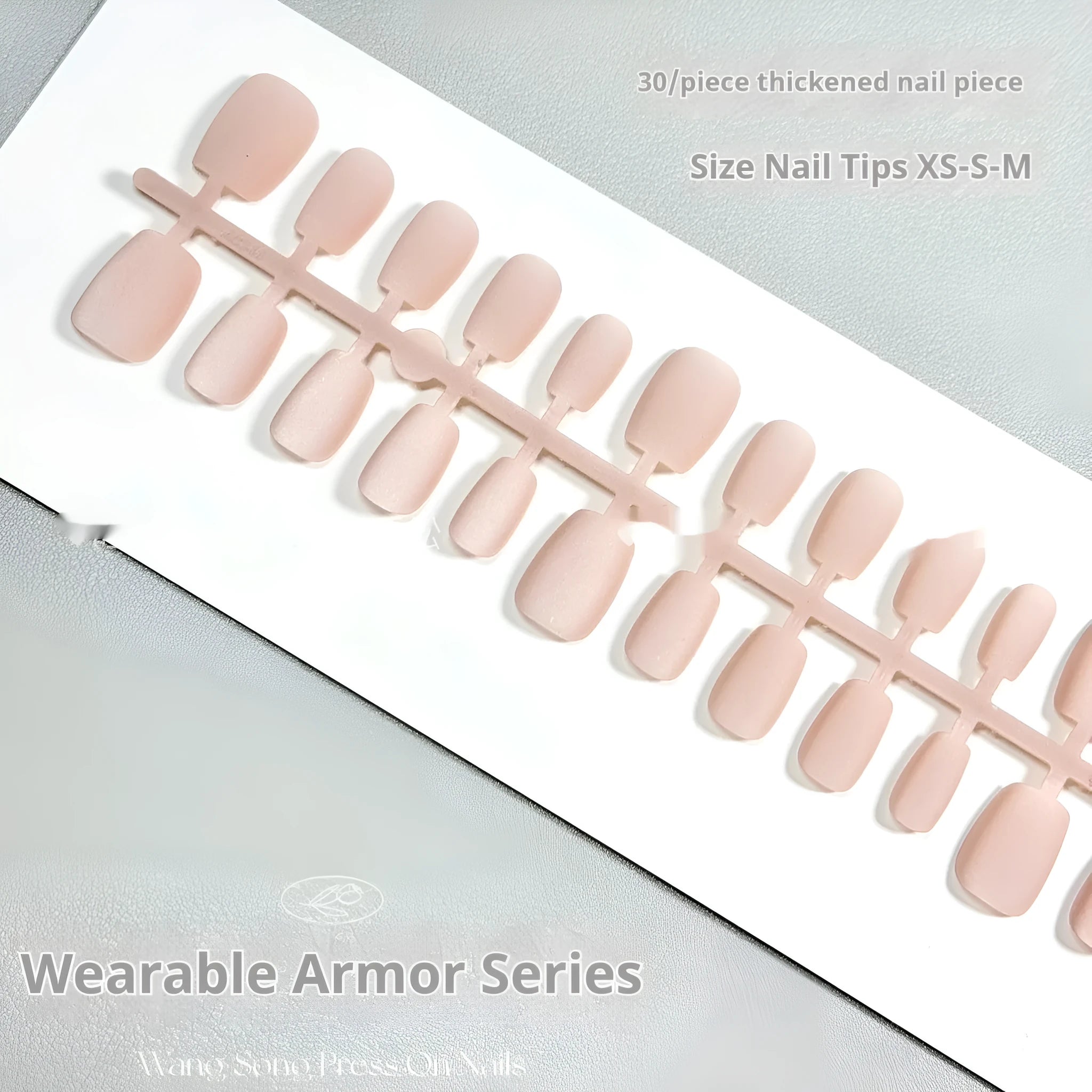 Frosted Velvet Cat's Eye false nails showing Aurora armour design on short ladder shaped PVC nails.