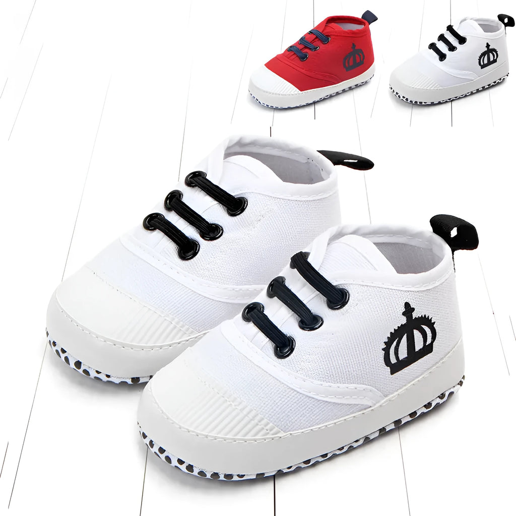 Canvas toddler shoes with elastic band in red and white on neutral background