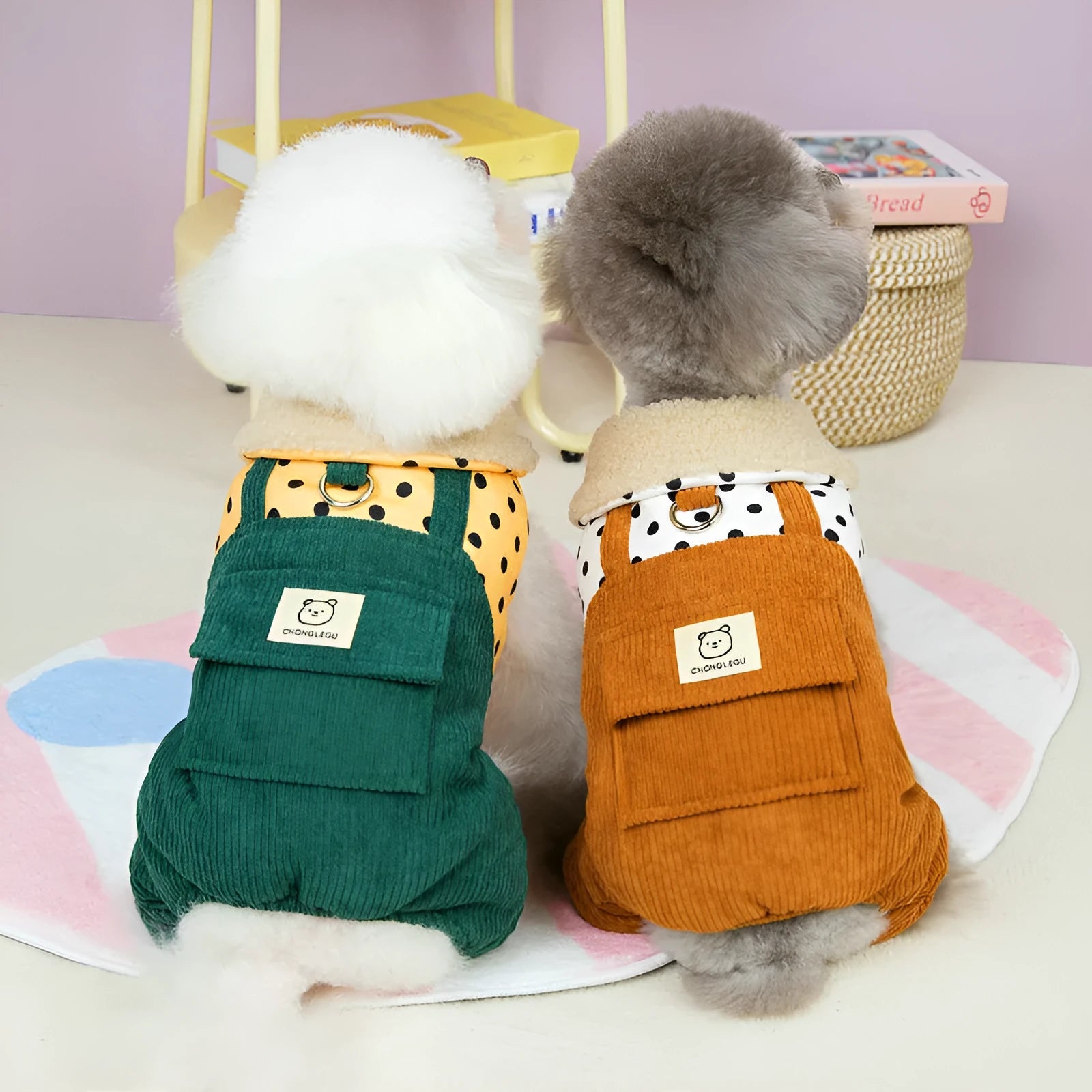 Four-legged cotton-padded dog coat in brown, with polyester outer fabric, laid flat on surface