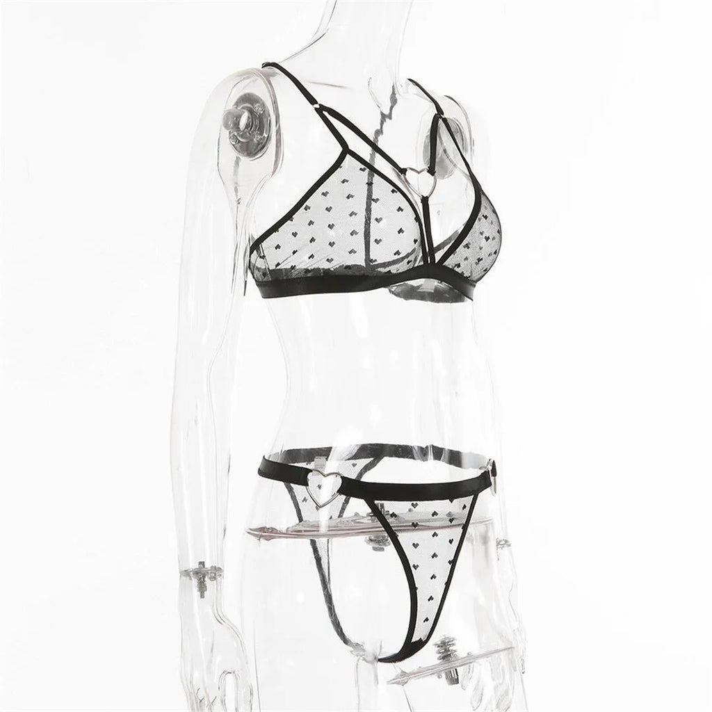 Ladies' black mesh two-piece set with top and pants on a hanger.