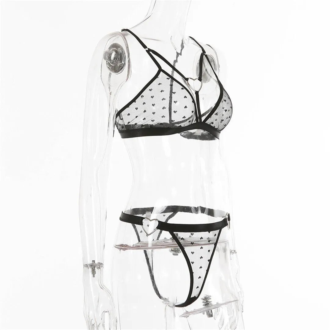 Ladies' black mesh two-piece set with top and pants on a hanger.