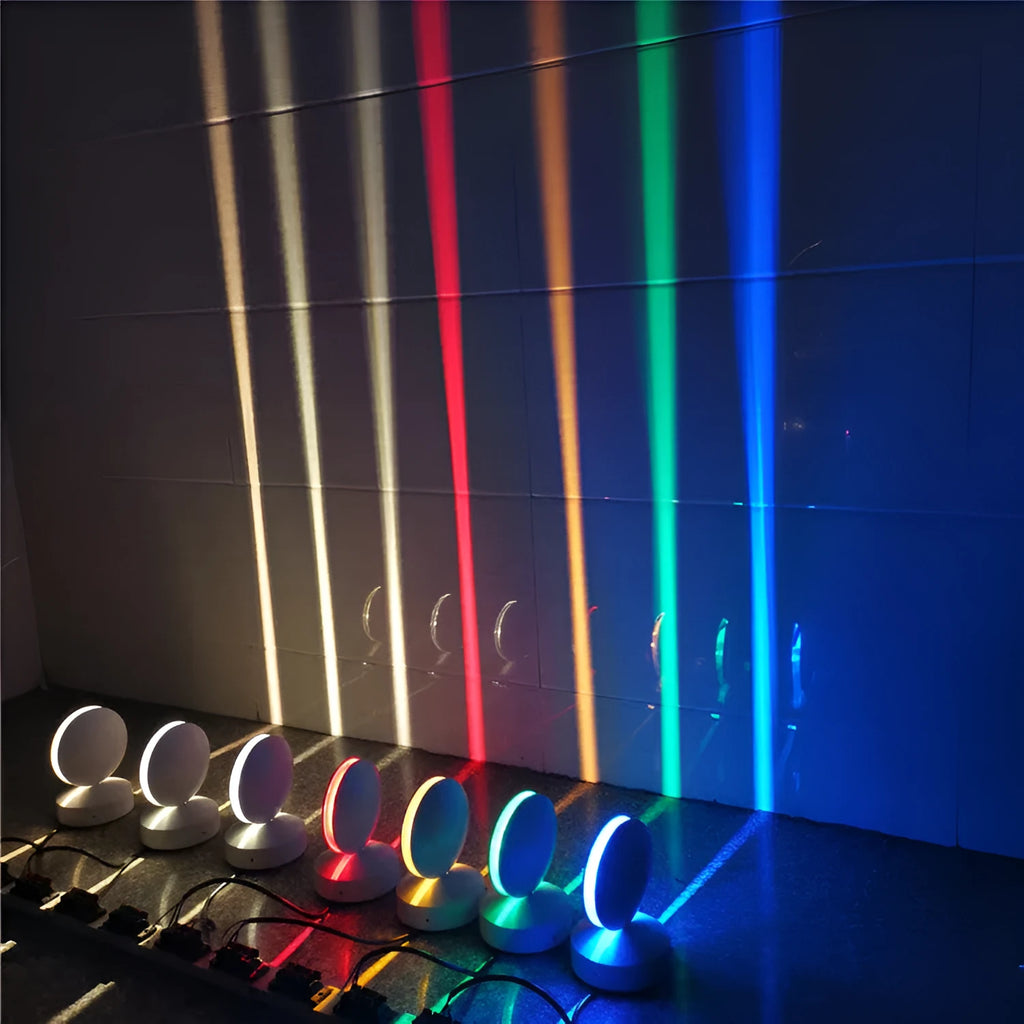 Modern aluminium LED spotlight bar wall lamp with glass lens, shown illuminating a corridor.