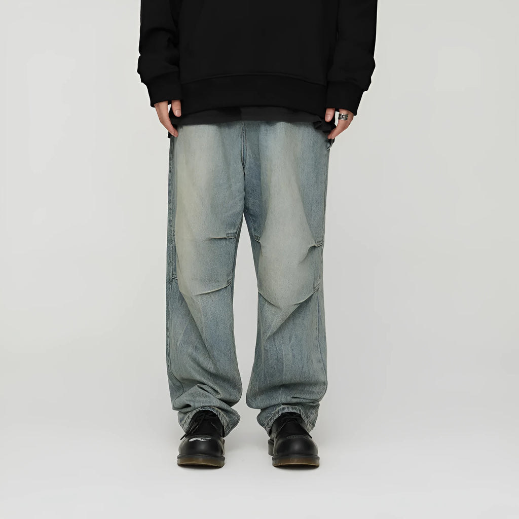 Light wash grey baggy oversized denim jeans with pleats, straight leg, 100% cotton, distressed washed blue