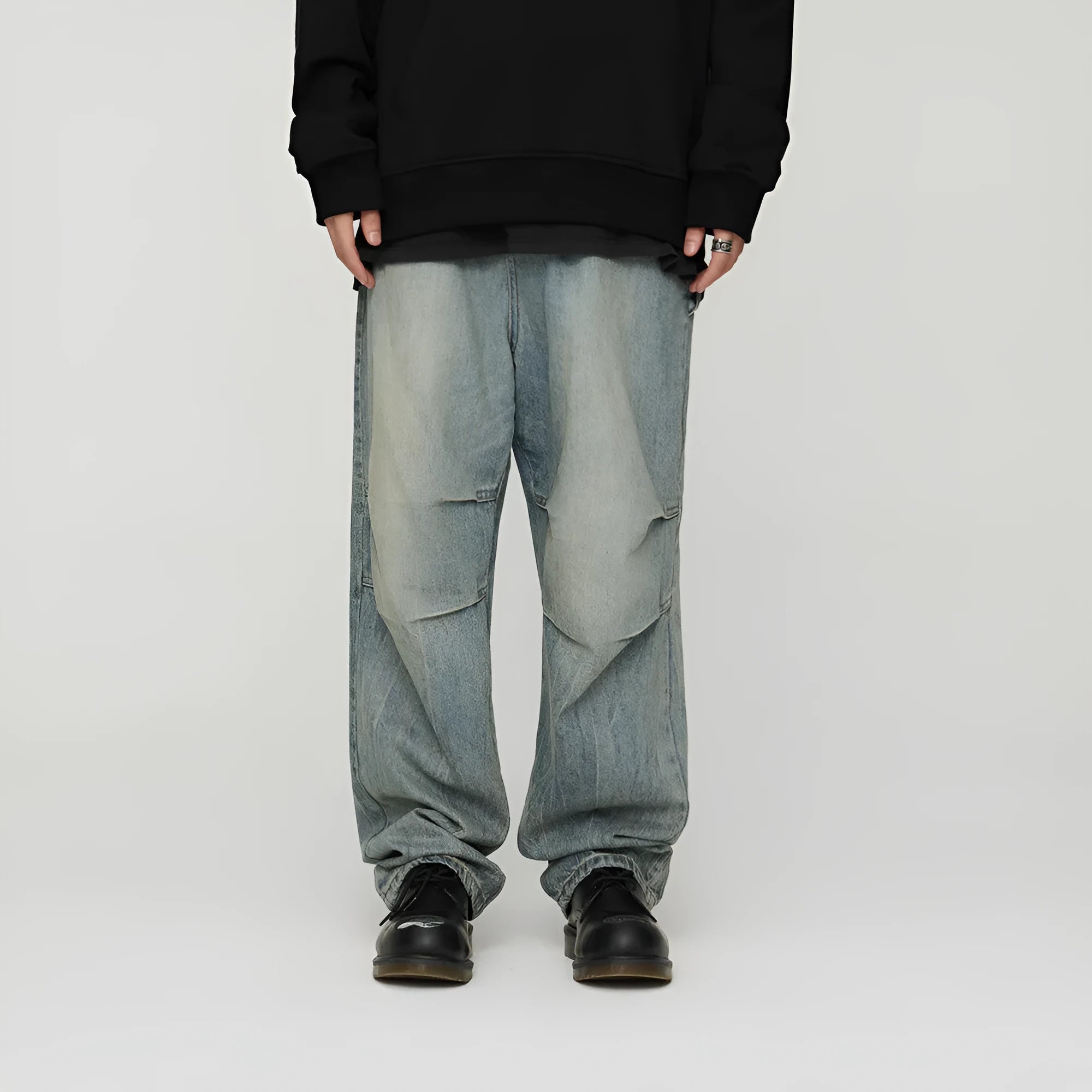 Light wash grey baggy oversized denim jeans with pleats, straight leg, 100% cotton, distressed washed blue