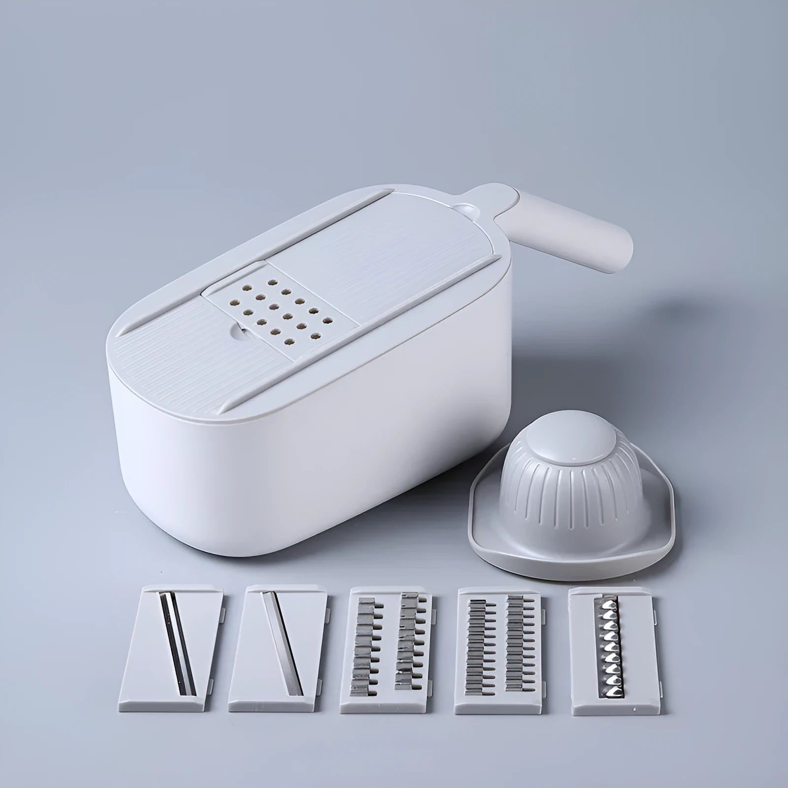 Blue multifunctional vegetable cutter with stainless steel blades in Nordic style design