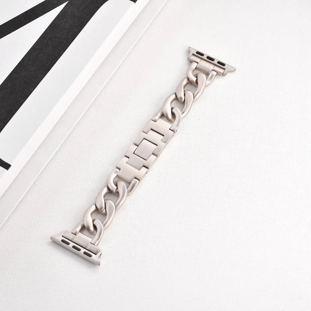 Denim chain design metal Apple Watch strap in multiple colour options showing lug connection