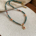 Freshwater pearl necklace with stone sun pendant on adjustable clavicle chain