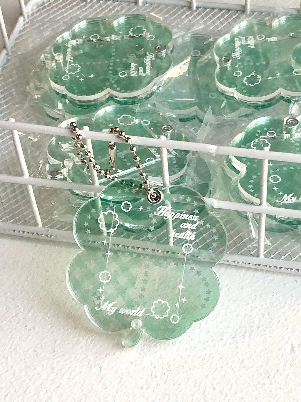 Acrylic four-leaf clover phone pendant keychain in blue, green, or mint