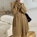 Women's knitted three-piece set showing wide-leg pants, top, and sweater cardigan in urban style