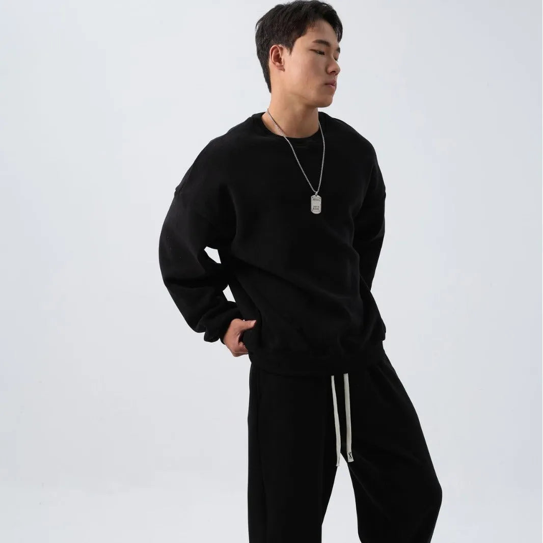 Men's polar fleece sports suit set showing jacket and trousers in winter colours