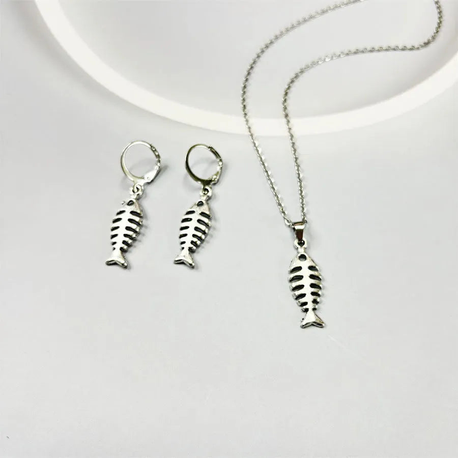 Female Creativity retro alloy jewellery set with fishbone pendant necklace and matching earrings on adjustable O-chain.