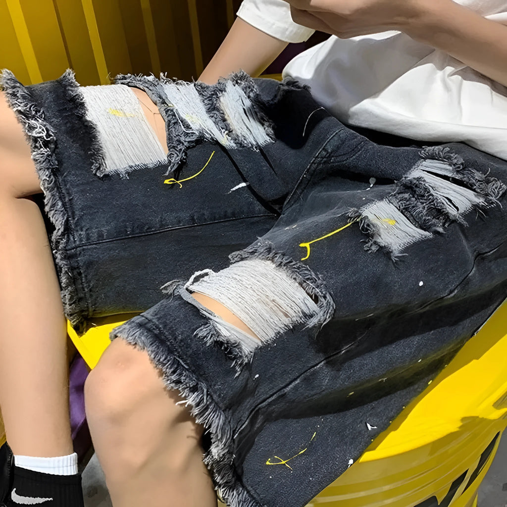 Men's loose-fit water-washed hole denim shorts in black or light blue colours