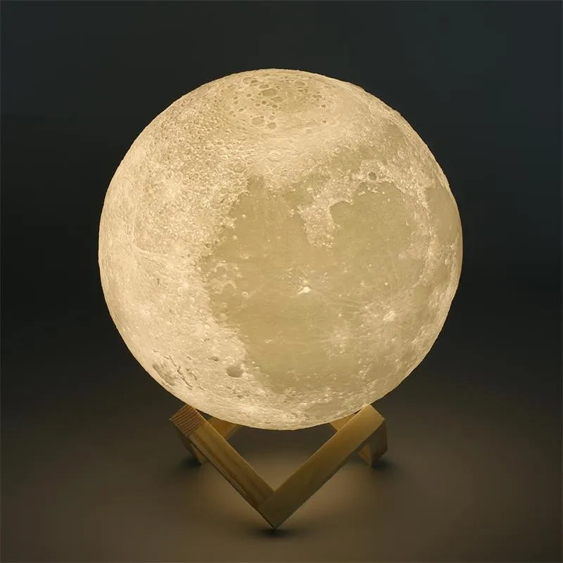 3D printed moon lamp on wooden stand with touch control ring at base, showing white and yellow light colours.
