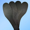 Black carbon fiber running shoe insoles showing full palm design and textured surface