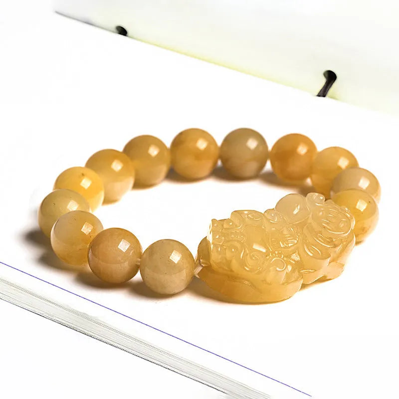 Golden Thread Jade money bracelet carved from Jinsi Jade showing large and small size options