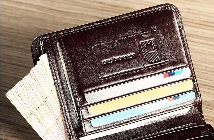 Men's leather wallet showing multiple compartments including banknote folder and card slots