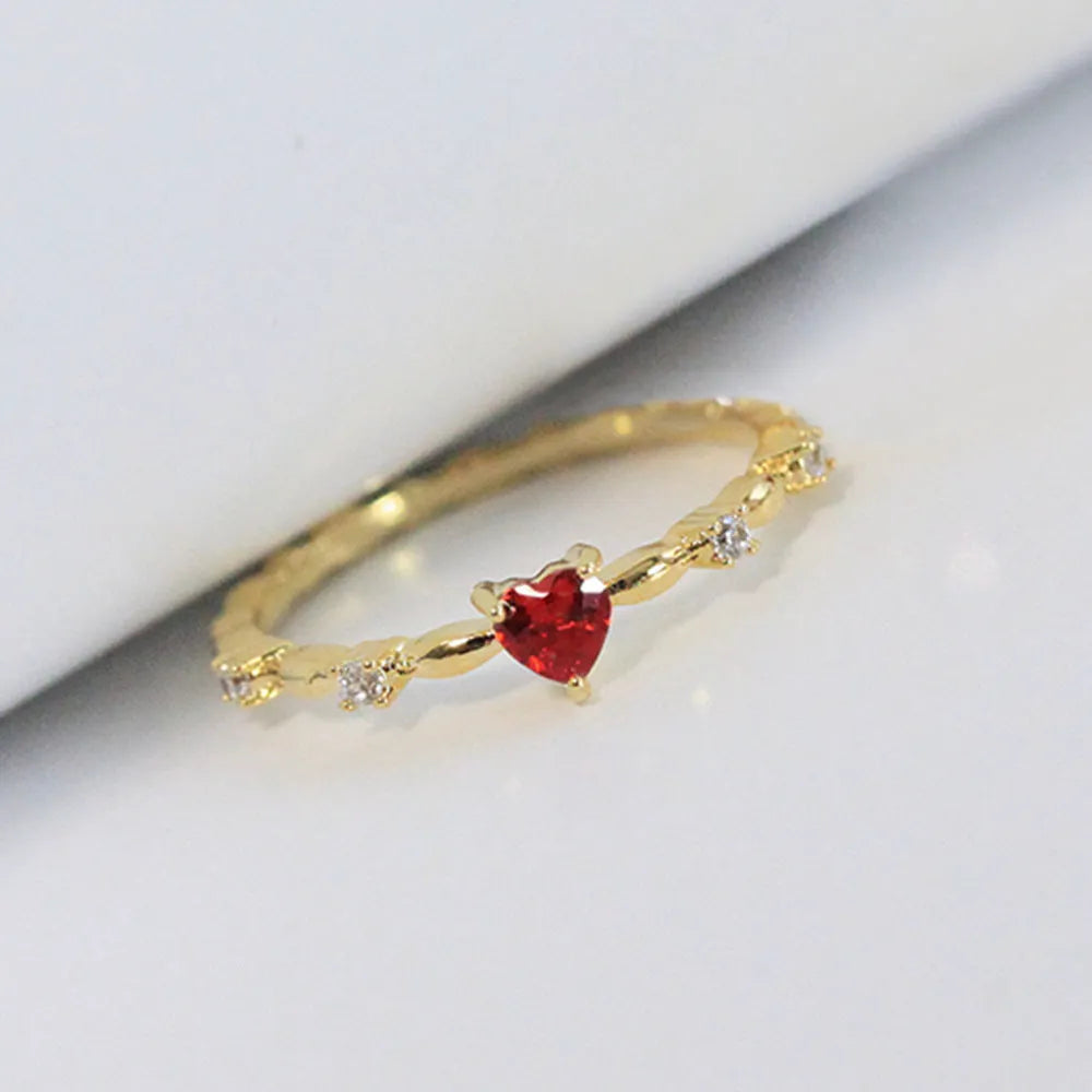 Zircon peach heart ring in gold or silver electroplated finish, sizes 6-10