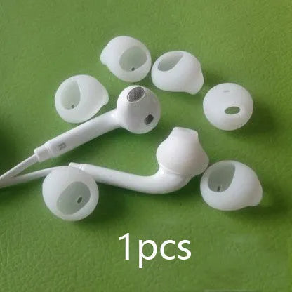 Black and white silicone protective sleeves for Galaxy S6 Edge in-ear headphones.