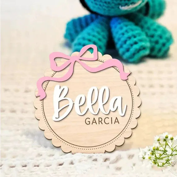 Customisable wooden square ornament for baby room decoration with space for a personalised name.