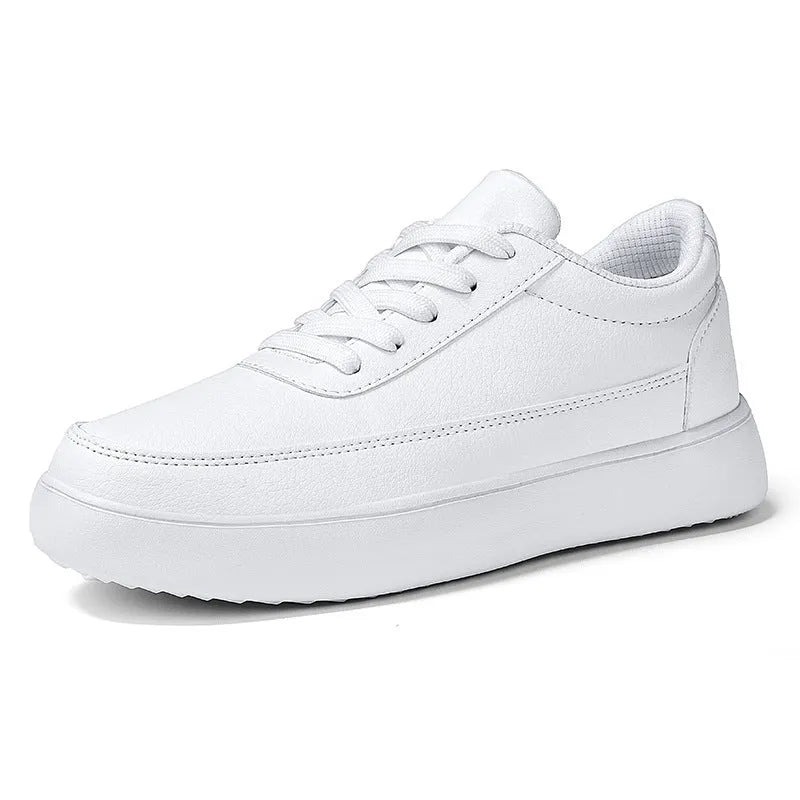 Women's white leather lace-up casual flat shoes on a plain background.