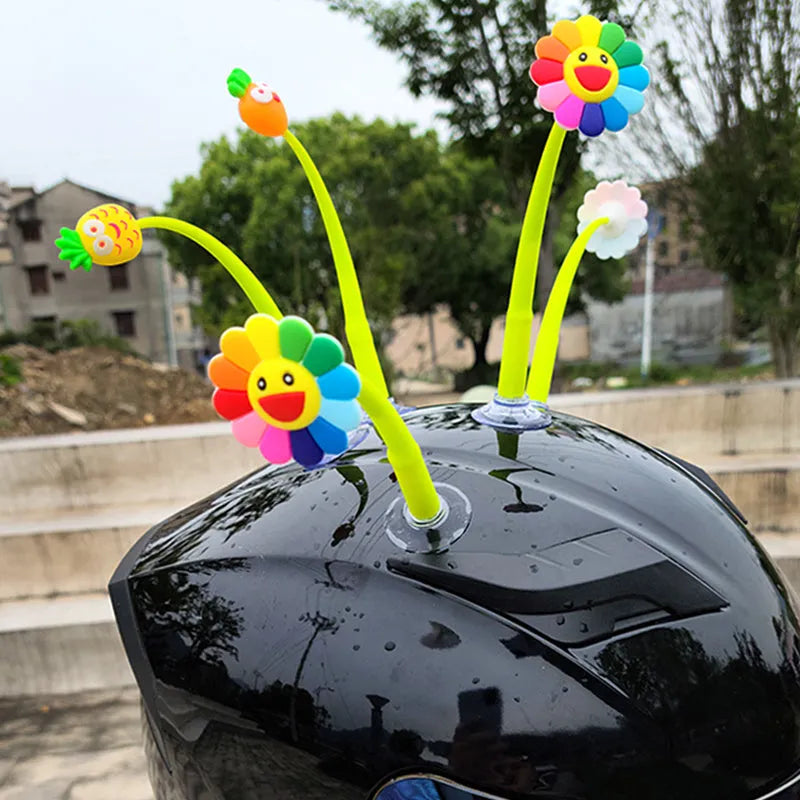 Yellow sunflower silicone helmet decoration with brown centre on suction cup base