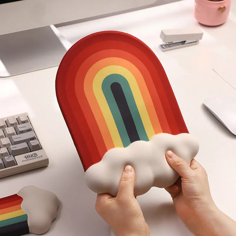 Silica gel wrister mouse pad and keyboard support set in a pastoral cloud pattern on a desk.