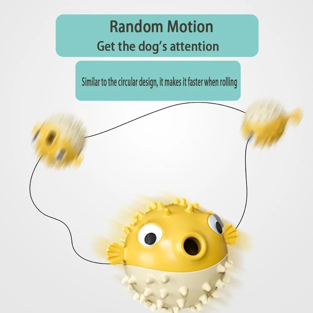 Green fish-shaped interactive dog toy with treat dispensing slots and raised cleaning texture