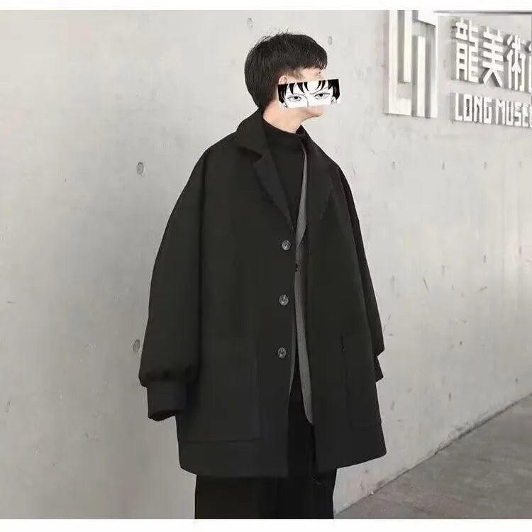 Men's loose Hong Kong style suit jacket in black plaid pattern with long sleeves