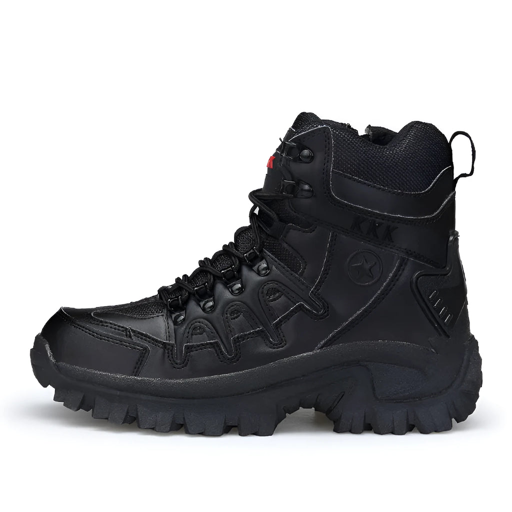 Men's black tactical boot with rubber sole on rocky outdoor ground