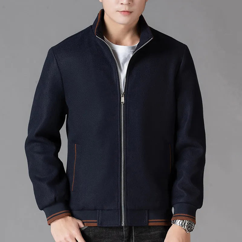 Men's grey sports-style fleece jacket with long sleeves and a zip chest pocket.