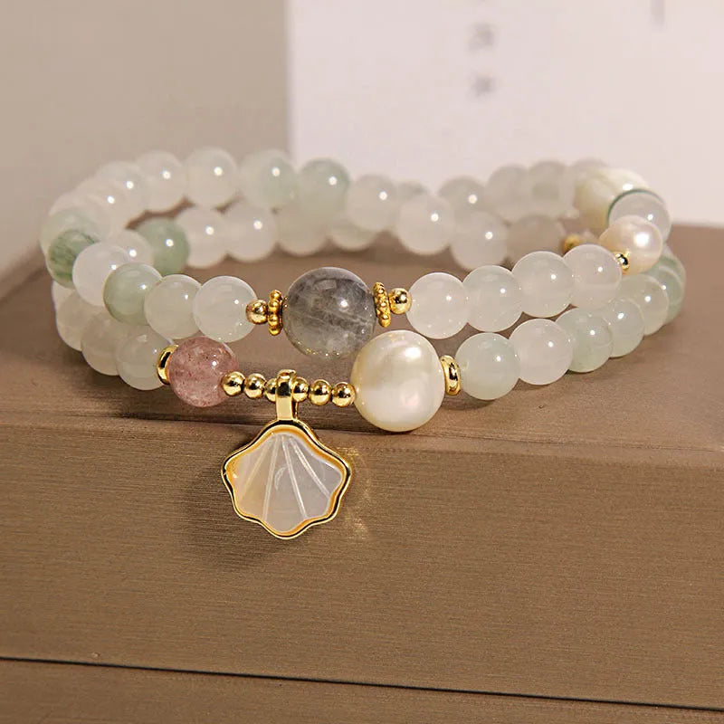 Crystal bracelet with gold-plated artificial gemstone inlay and Tianshan Jade shell ginkgo leaf pendant