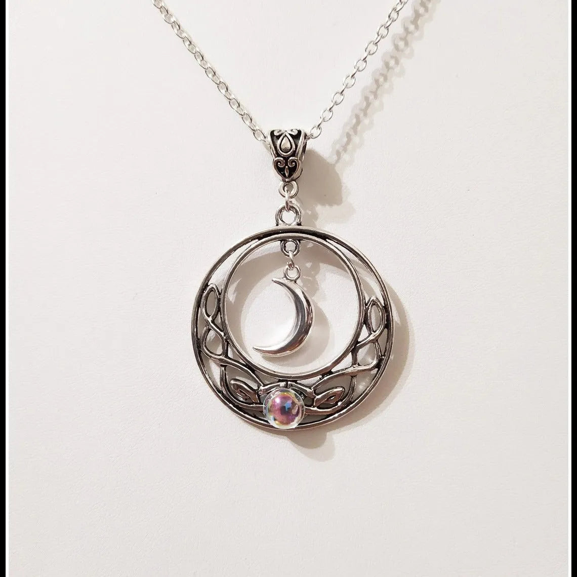 Celtic crescent crystal necklace for women with alloy cross chain and glass moon pendant in colour AQ-3073