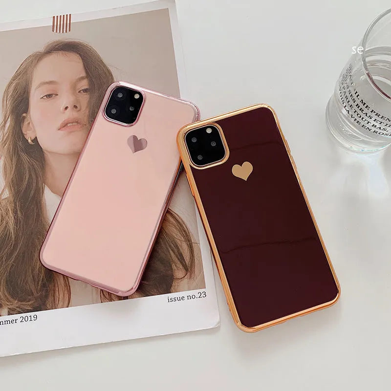 Clear solid colour TPU back cover case for iPhone on a table, shown in blue.