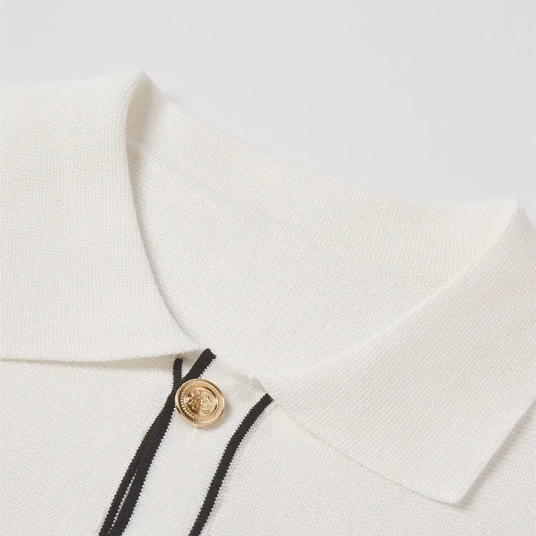White short sleeve cardigan with dark contrast lapels, showing front view.