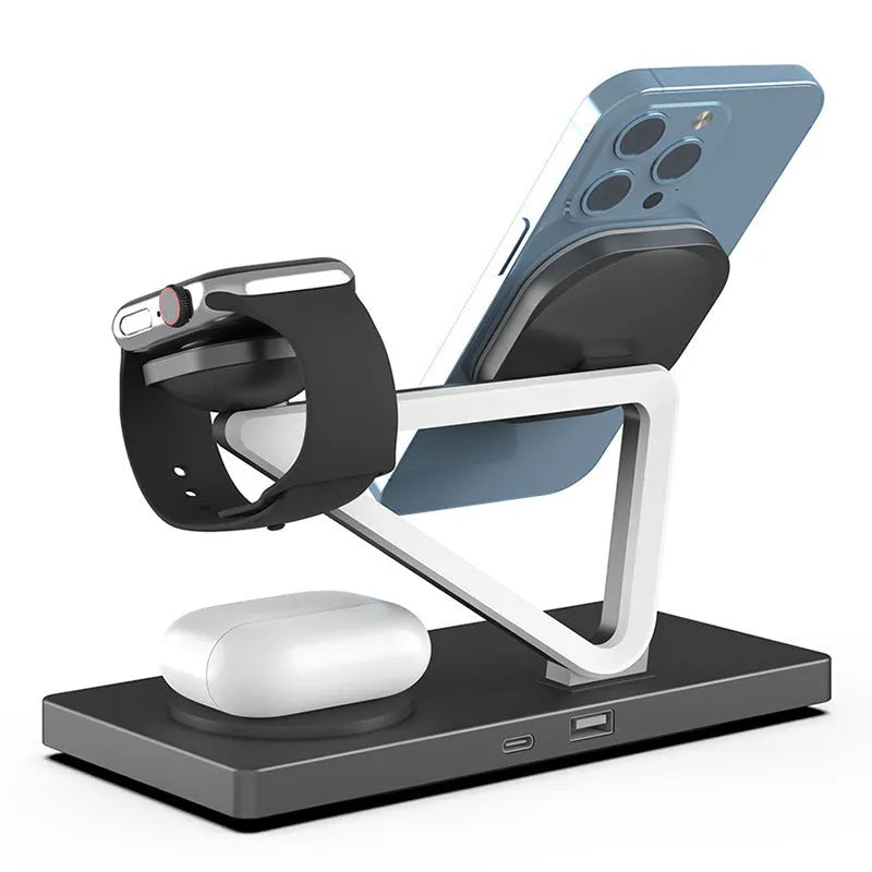 White five-in-one wireless charging station with magnetic phone bracket, circular pad, and watch dock, showing a night light glow.