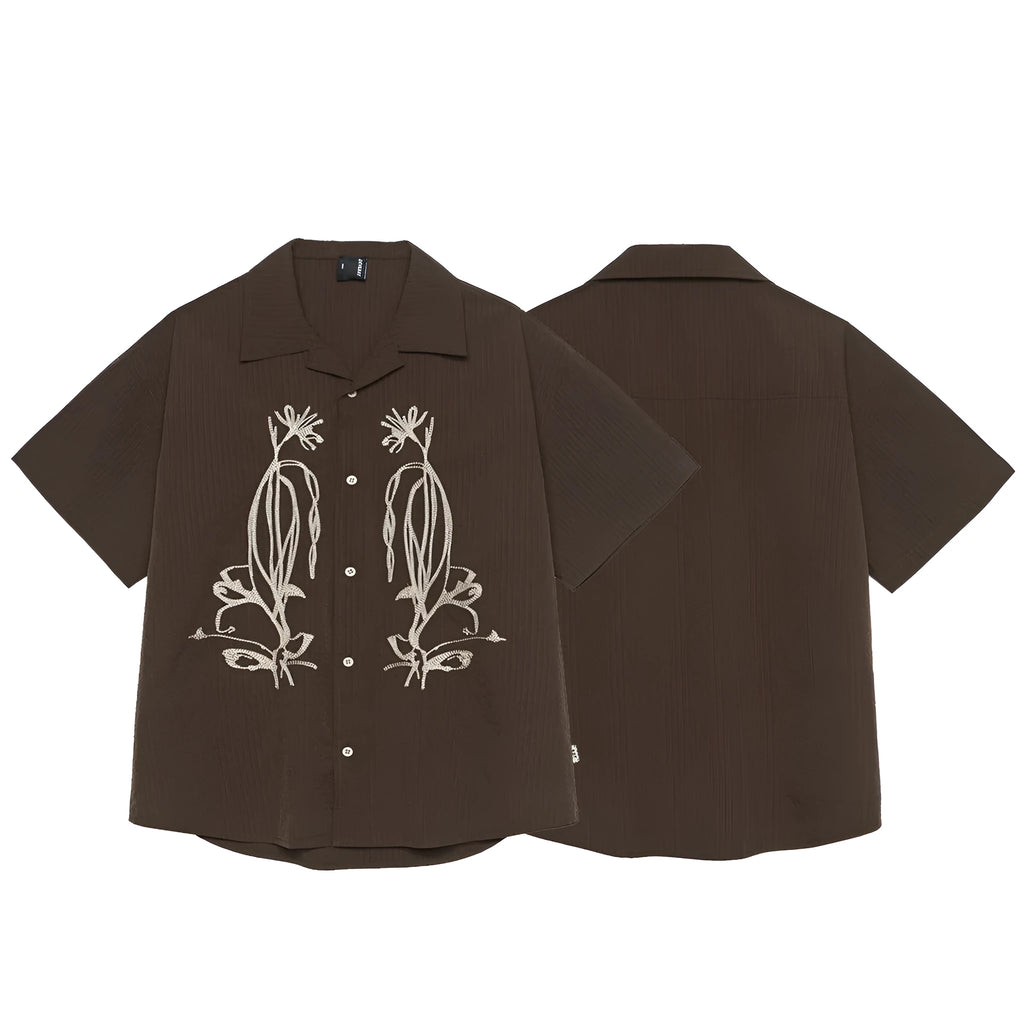 Brown striped short sleeve outdoor shirt with Cuban collar on a mannequin.