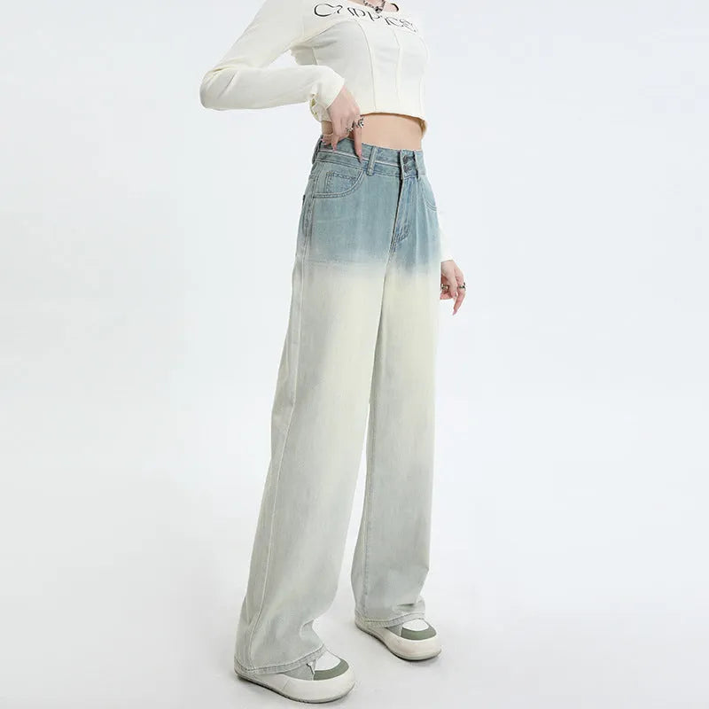 Women's gradient blue straight-leg denim trousers with wide leg design showing colour transition effect