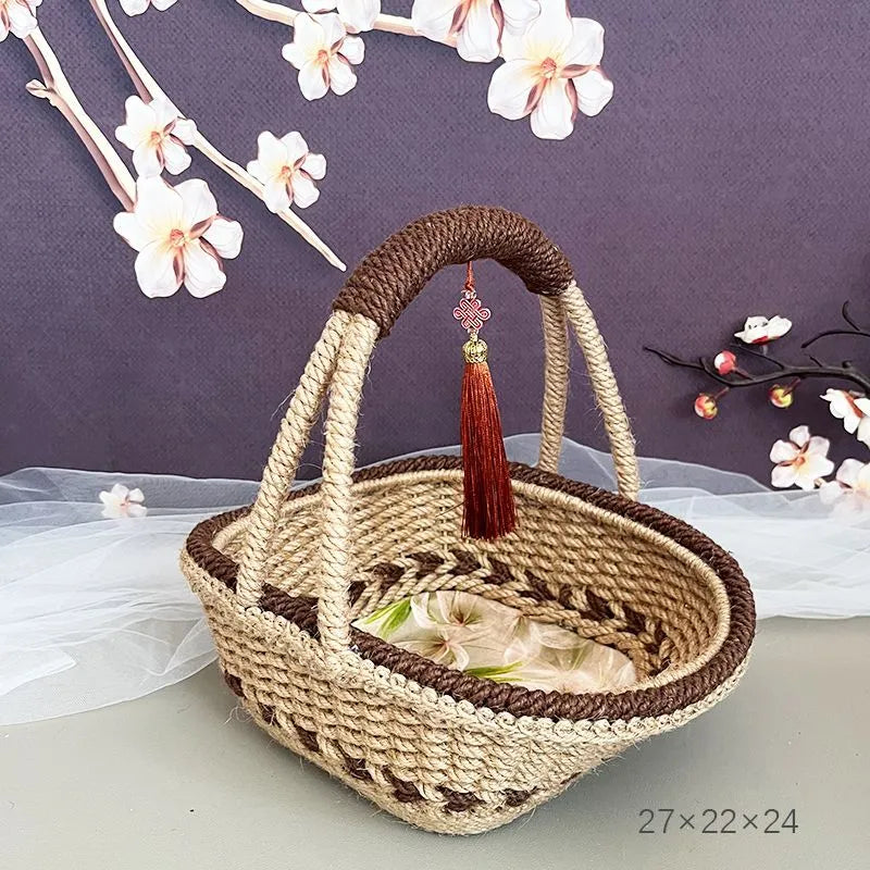 Hand-woven straw basket with hemp rope detailing in coffee brown colour