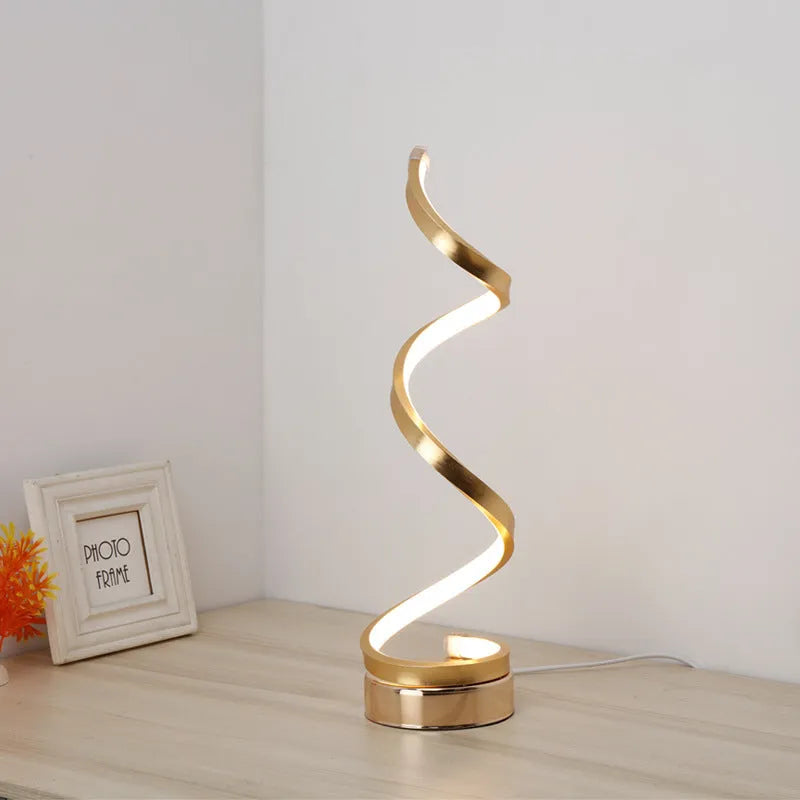 Minimalist black and white LED bedside lamp with aluminium shade measuring 125x450mm
