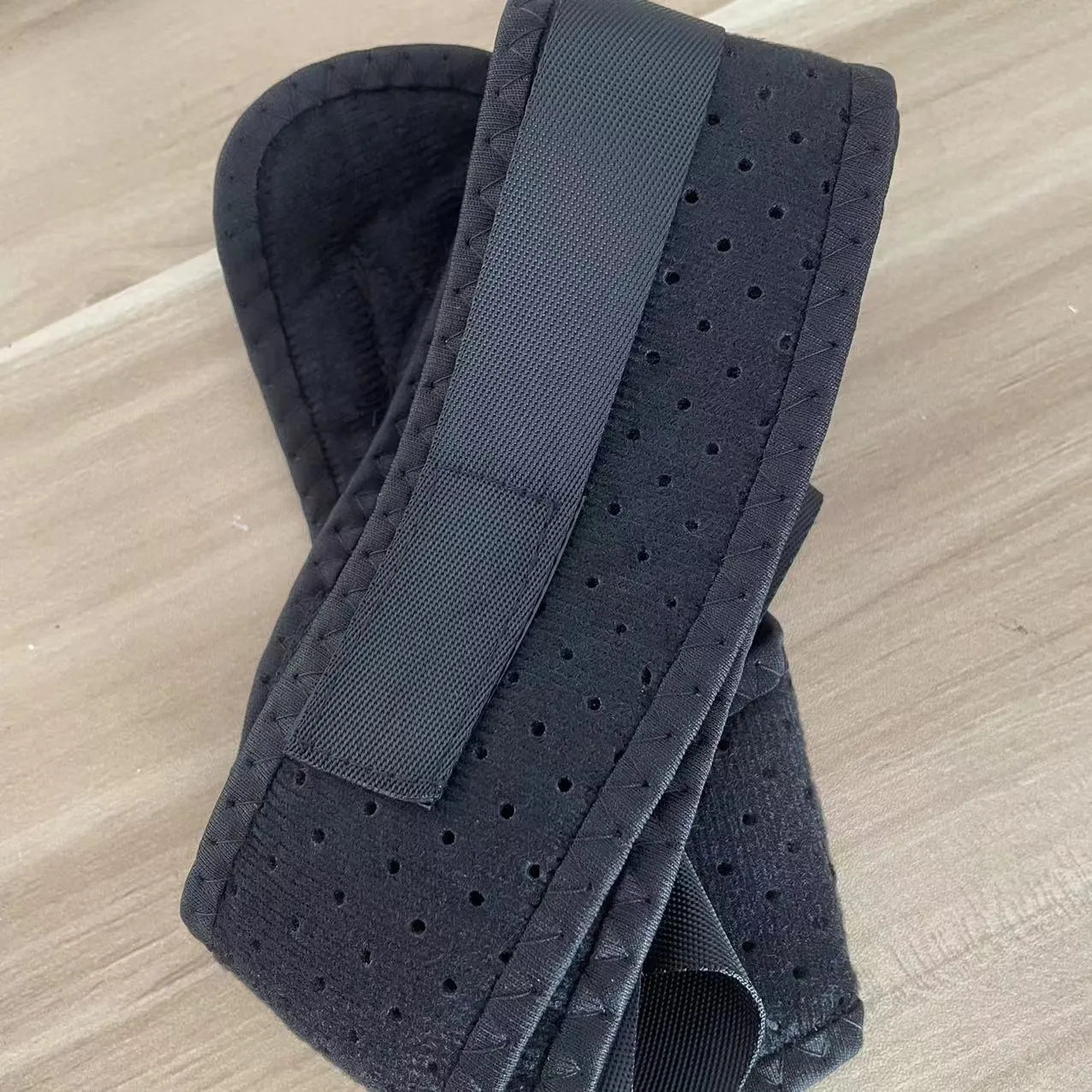 Babaka adjustable nylon posture correction belt for back support.